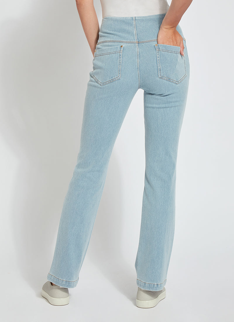 color=Bleached Blue, back view, knit denim jean leggings with deep side pocket, skims hips and thighs and opens into bootcut hem