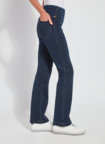color=Indigo, side view, knit denim jean leggings with deep side pocket, skims hips and thighs and opens into bootcut hem