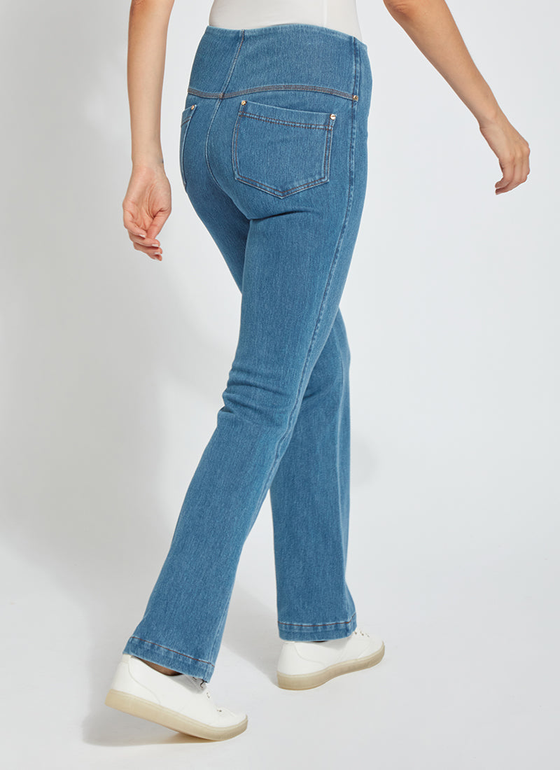 color=Mid Wash, back angle, knit denim jean leggings with deep side pocket, skims hips and thighs and opens into bootcut hem