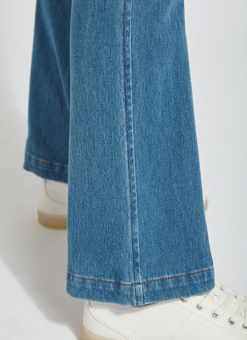 color=Mid Wash, hem detail, knit denim jean leggings with deep side pocket, skims hips and thighs and opens into bootcut hem