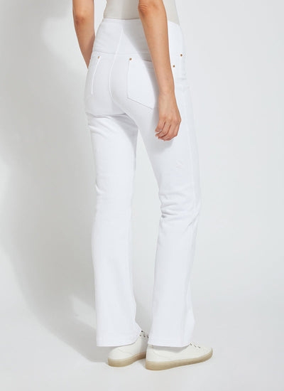 color=White, back view, knit denim jean leggings with deep side pocket, skims hips and thighs and opens into bootcut hem