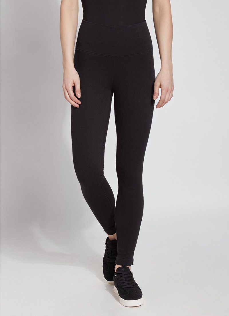color=Black, front view, plus size denim skinny jean leggings with concealed smoothing waistband for flattering fit