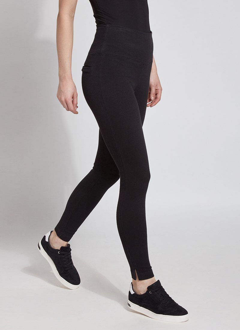 color=Black, Angled side view black denim skinny jean legging with concealing waistband