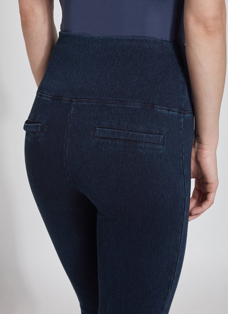 color=Indigo, Rear detail view of indigo denim skinny jean legging with concealing waistband