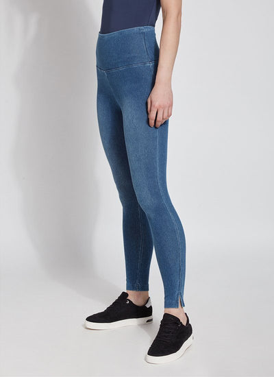 color=Mid Wash, angled front view of denim skinny jean legging with concealing waistband, seen from waist down