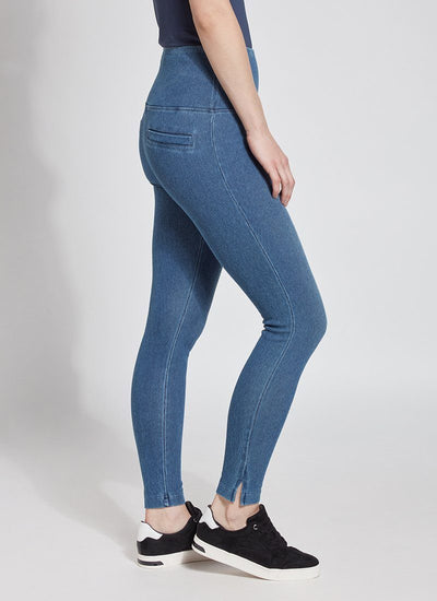 color=Mid Wash, side view of denim skinny jean legging with concealing waistband, seen from waist down