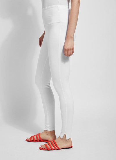color=White, Side view white denim skinny jean legging with concealing waistband, seen from waist down