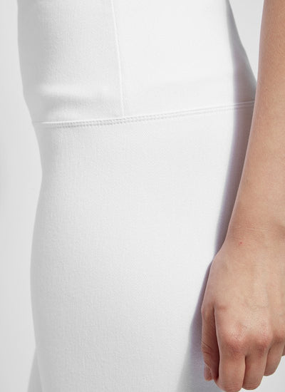 color=White, Side detail shot of white cotton and spandex leggings with concealed slimming signature waistband, left hip