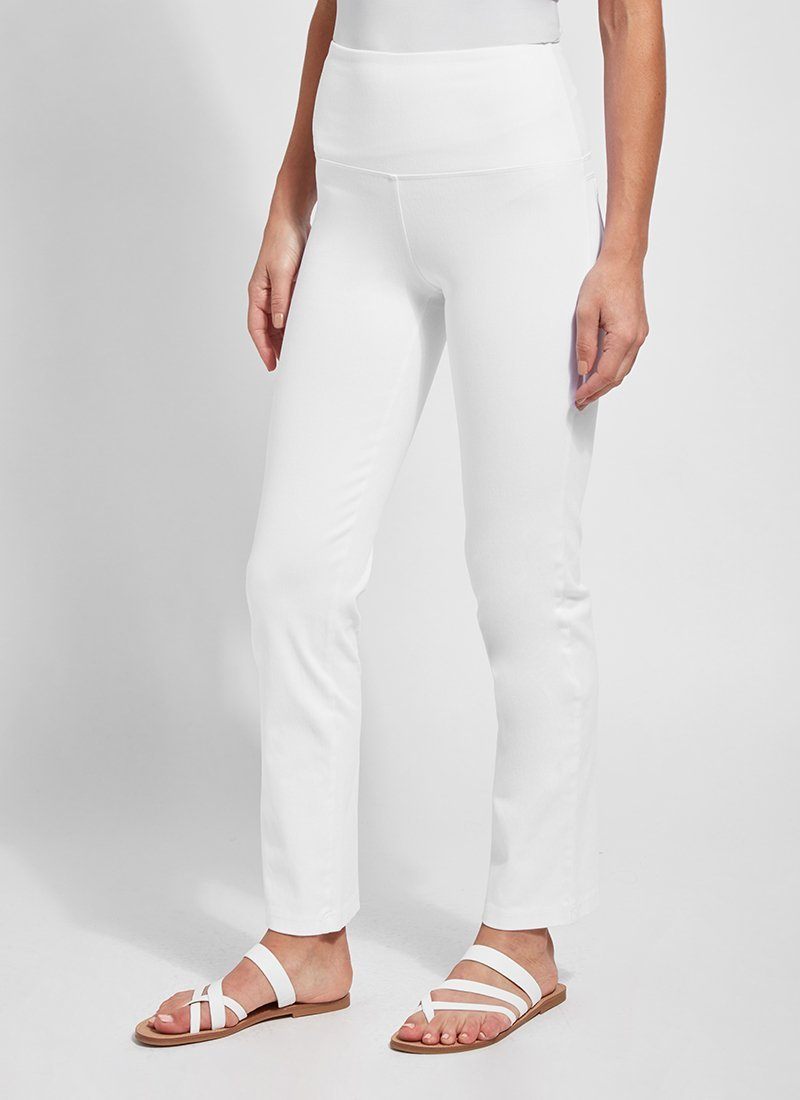 color=White, Angled front view of white denim straight leg jean leggings with patented concealing waistband